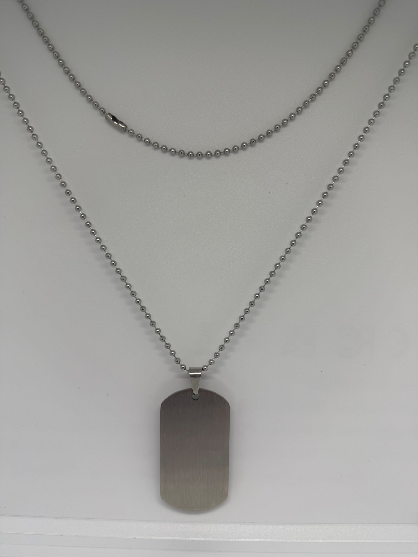 Stainless steel army chain with two tag pendants.