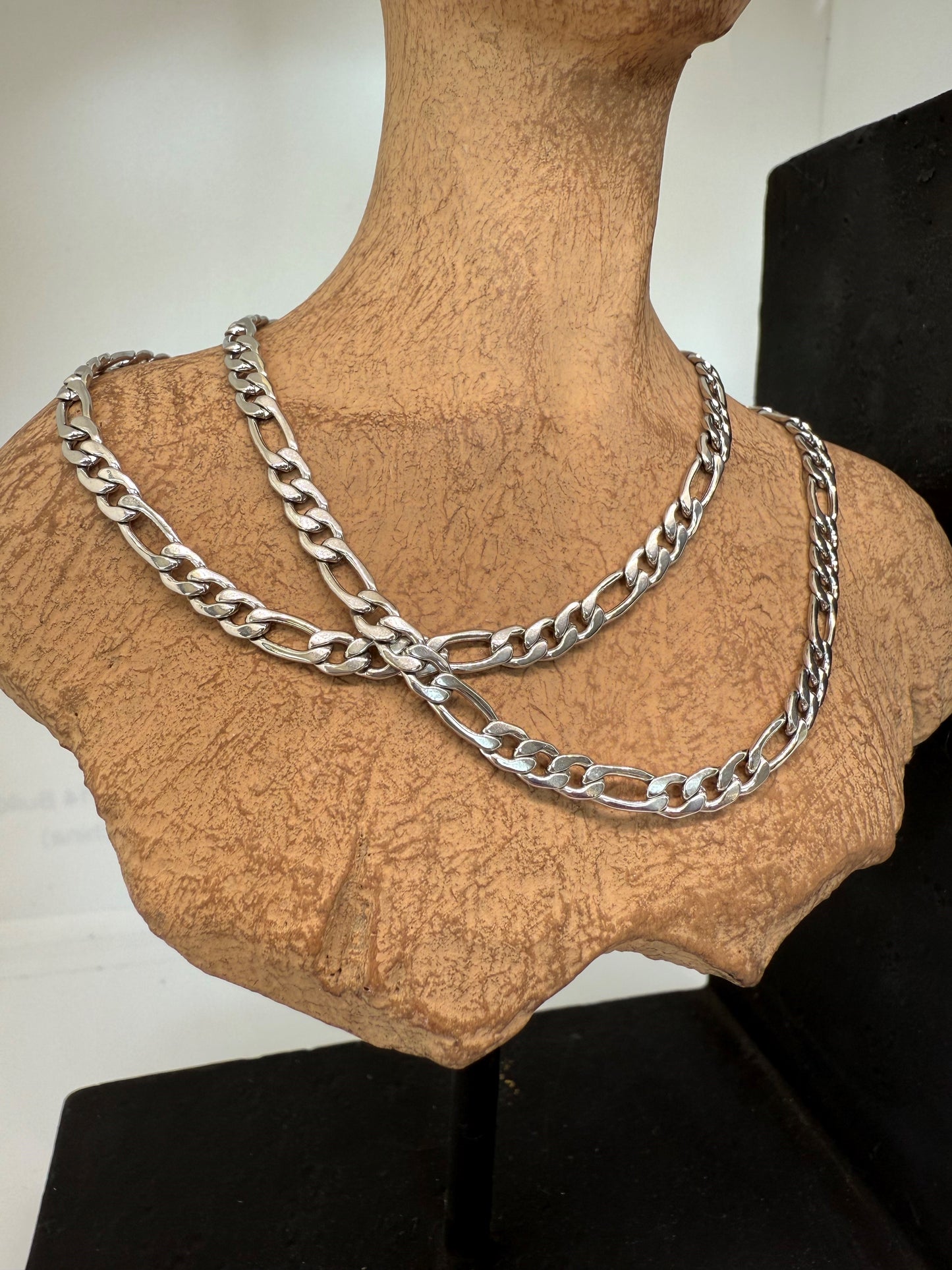 Stainless silver chain. 3 and 1 links. Small